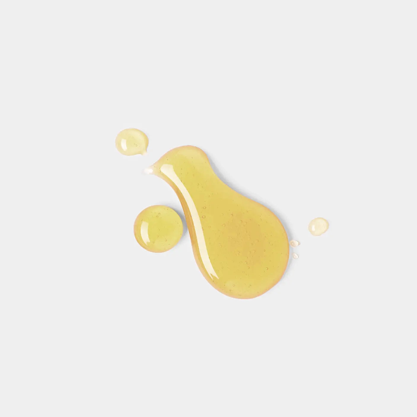 photo texture huile sur fond gris huile visage apaisante marque beauté bien être holistique days of confidence huile pour le visage huile visage jojoba oil huile bio pour le visage huile de jojoba bio huile hydratante visage huile visage non comedogene huile visage peau mature huile visage nuit macadamia